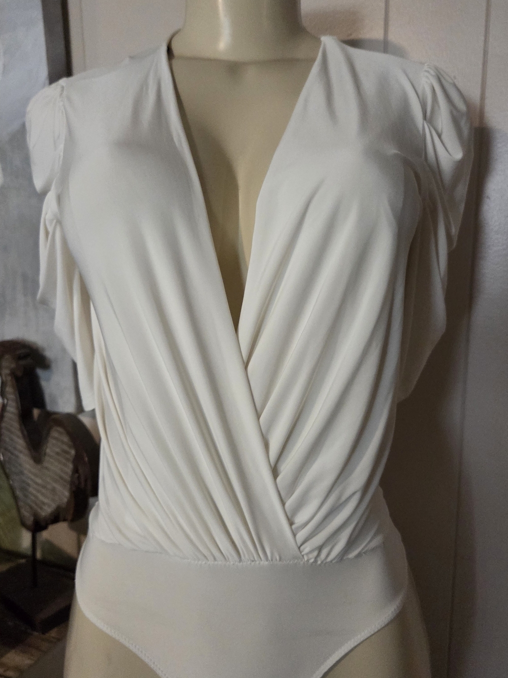 21SAINTS Women's Cream Surplice Bodysuit